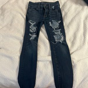American Eagle dark jeans with holes size 0